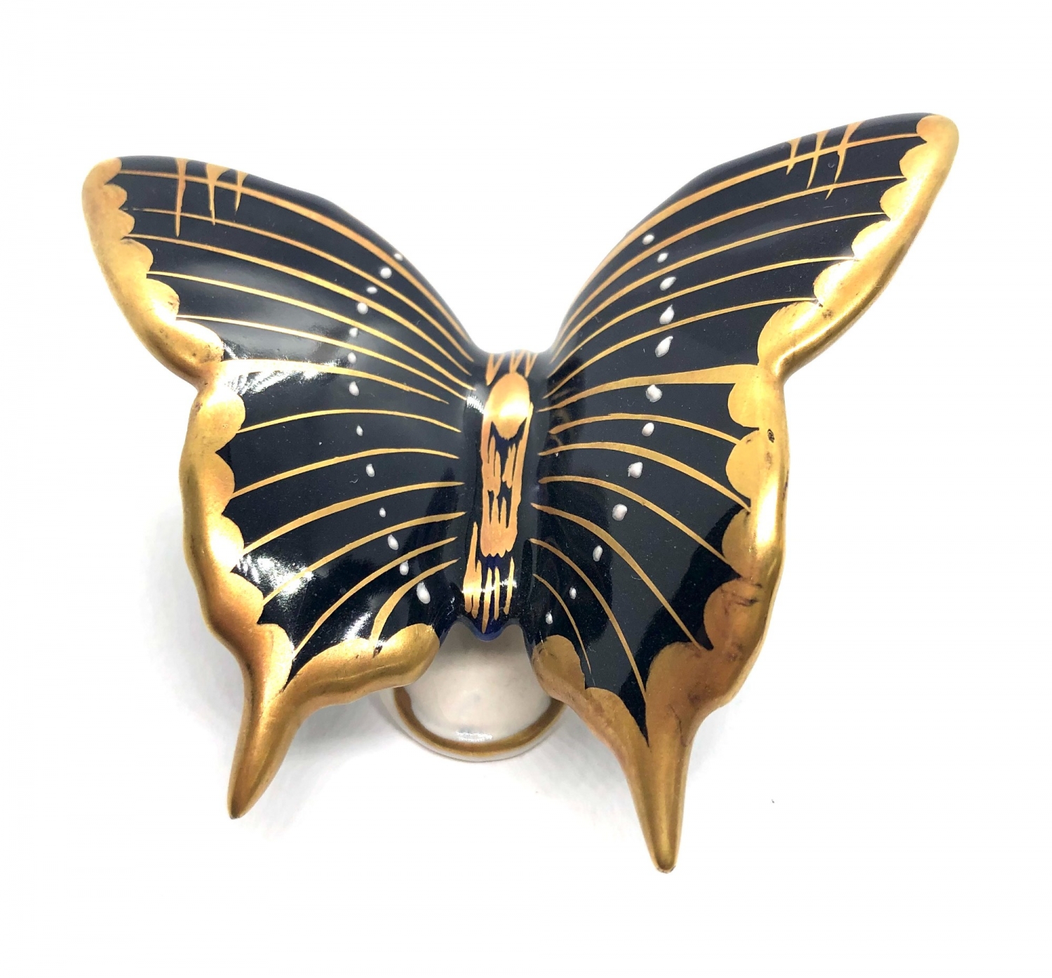 Porcelánový motýl – Kämmer