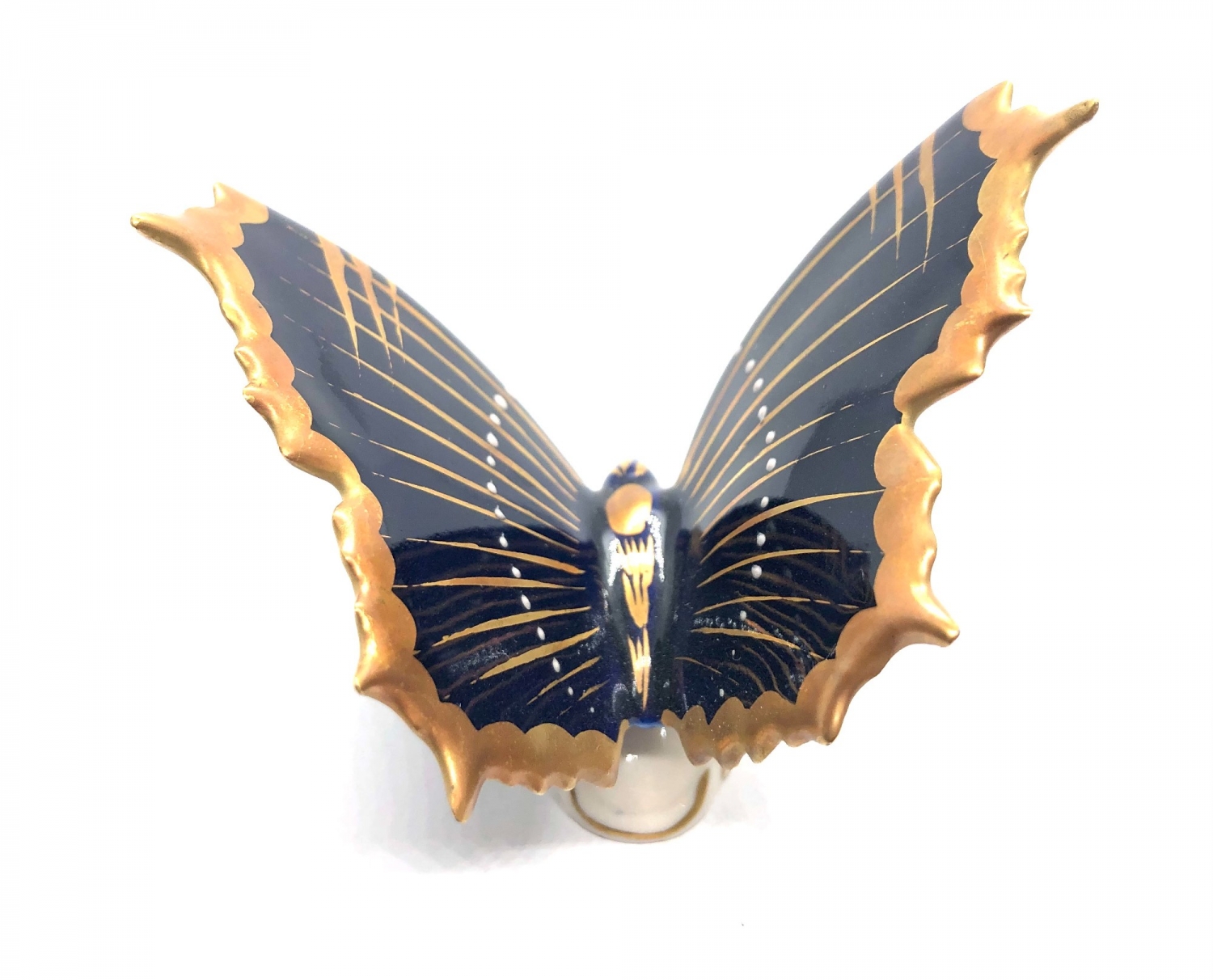 Porcelánový motýl ve vzletu – Krämmer