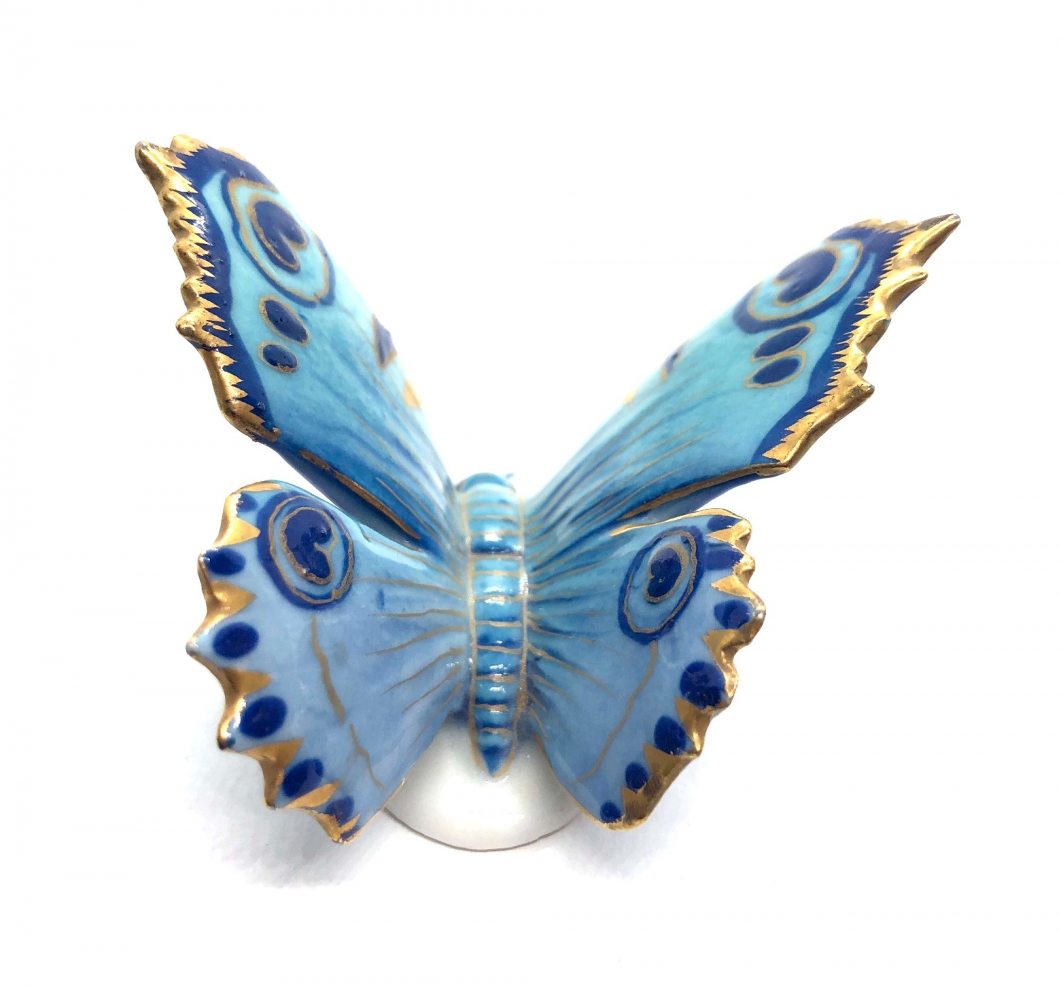 Porcelánový motýl - Ens