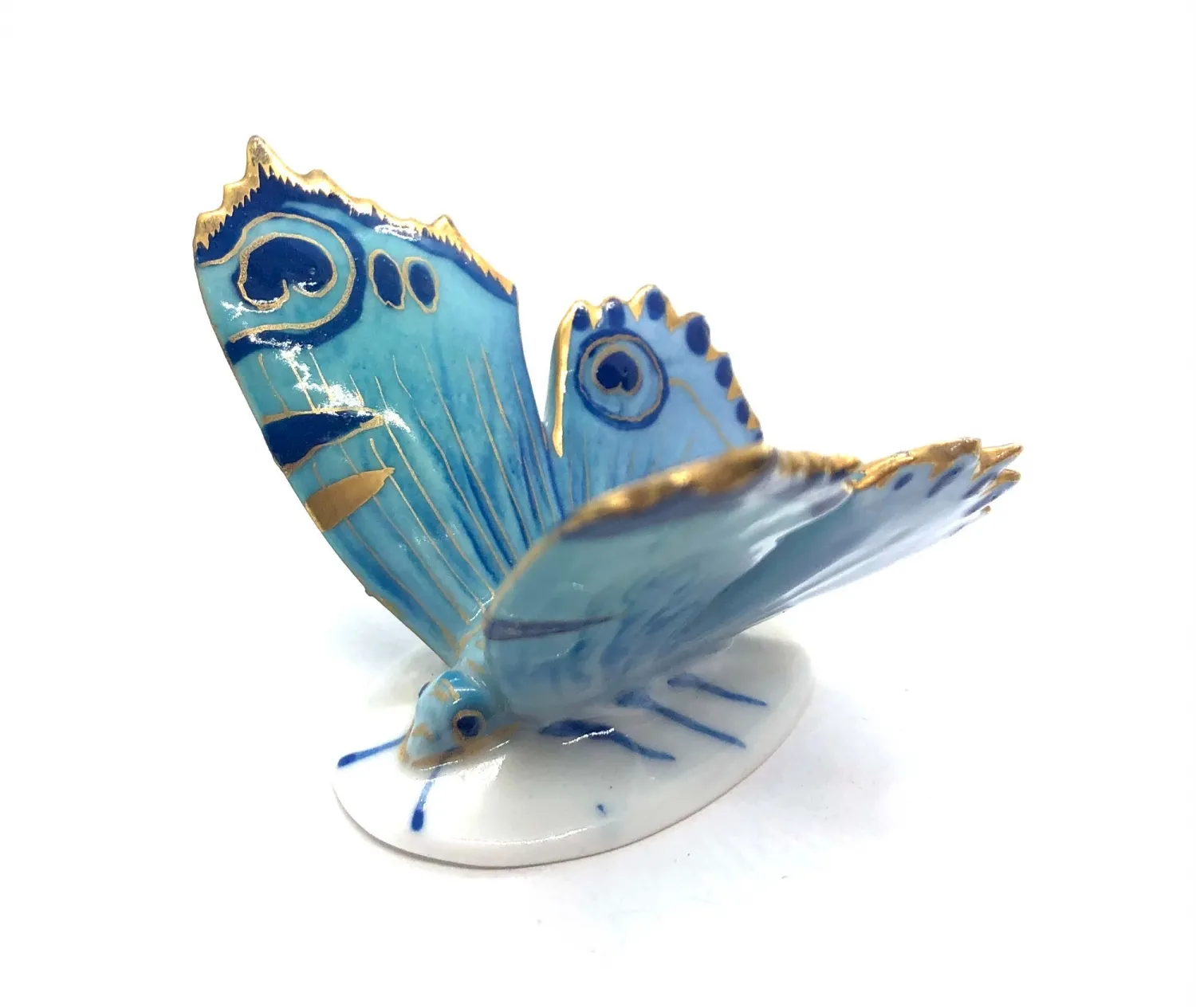 Porcelánový motýl – Ens - 7
