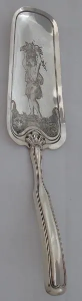 Stříbrná lopatka s figurálním motivem - 1