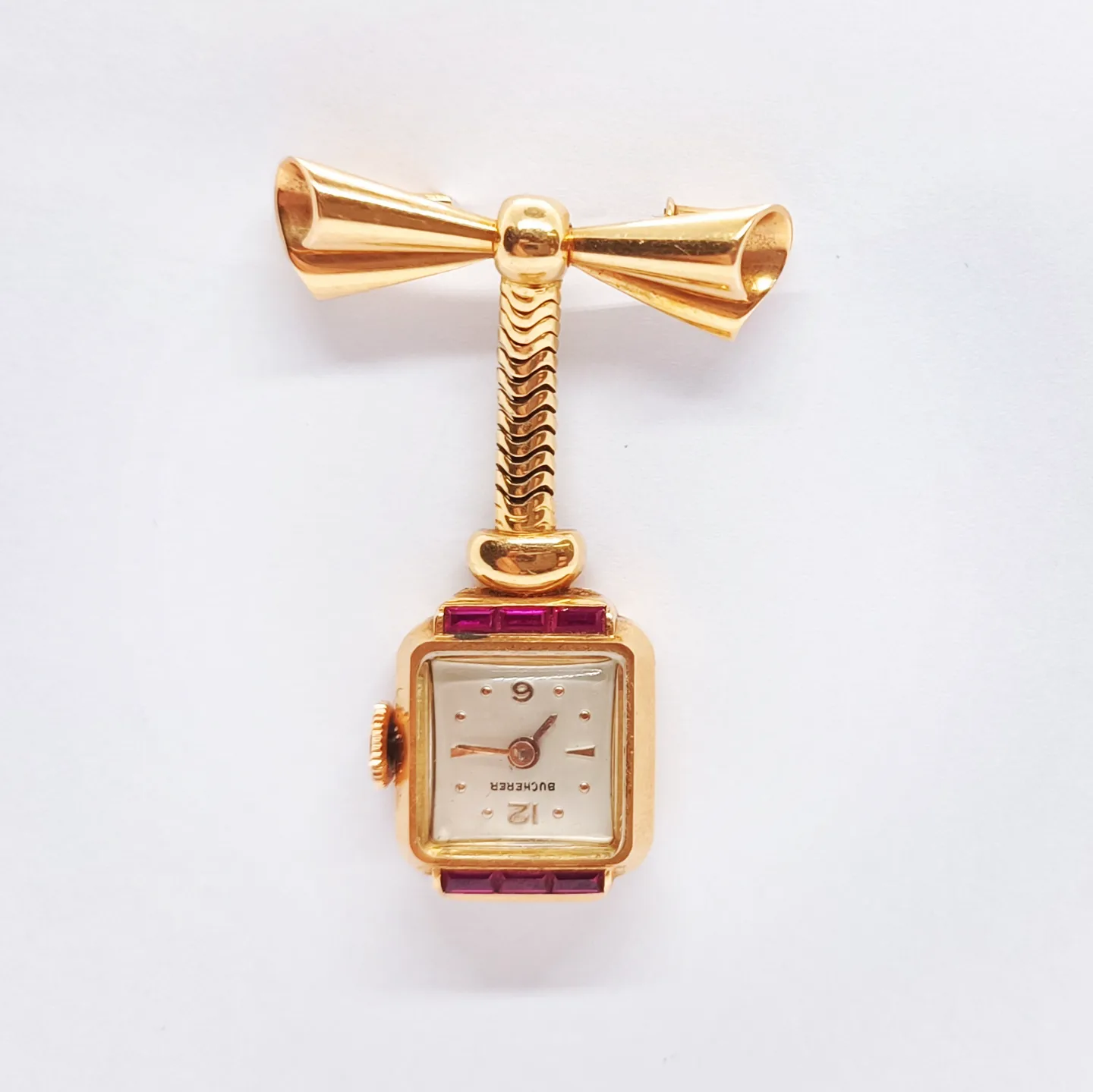 Zlatá brož s hodinkami zn. Bucherer