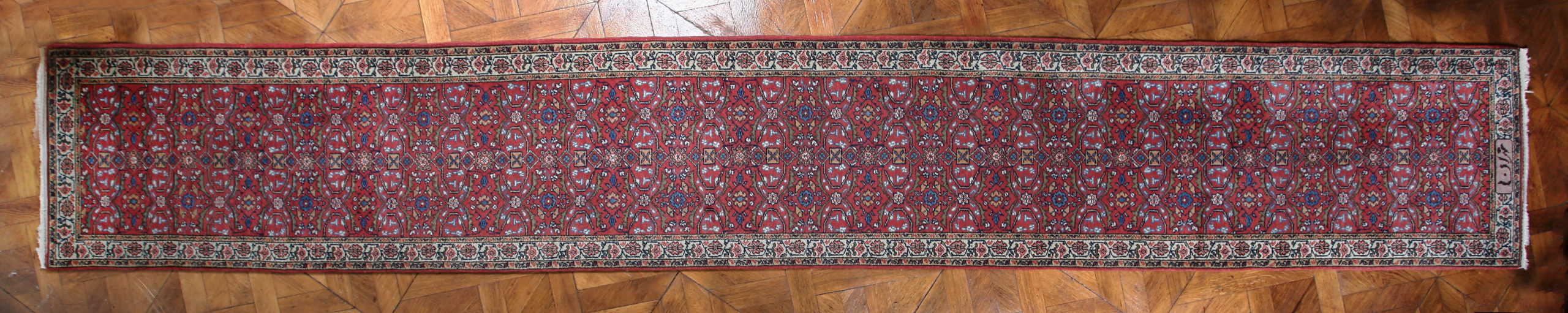 Perský vlněný běhoun. Signovaný. 495 x 75 cm