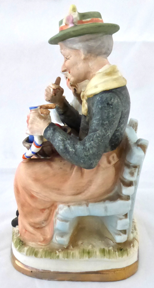 Babička s chlapečkem na lavičce - 2