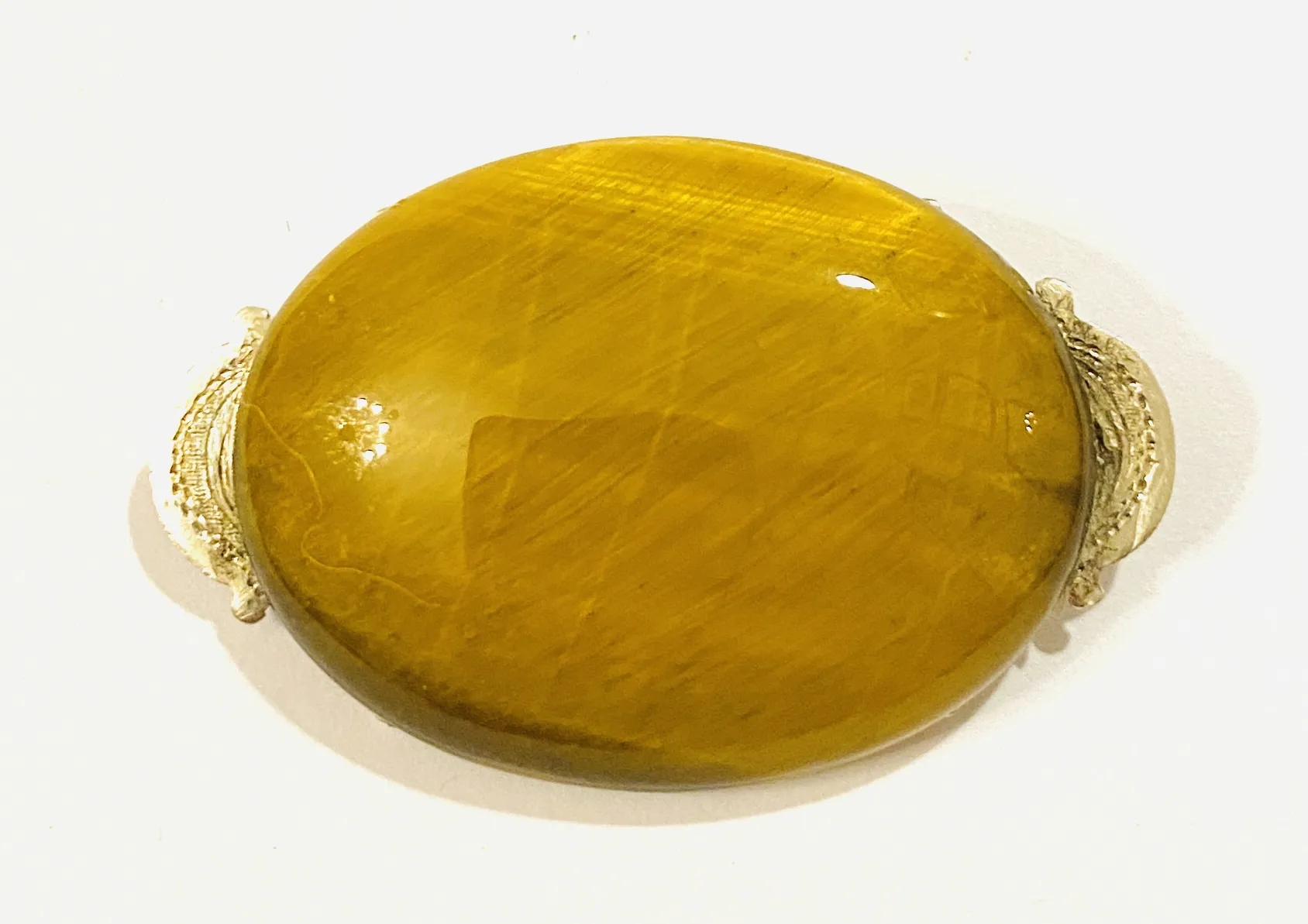 Stříbrná art-deco brož s tygřím okem