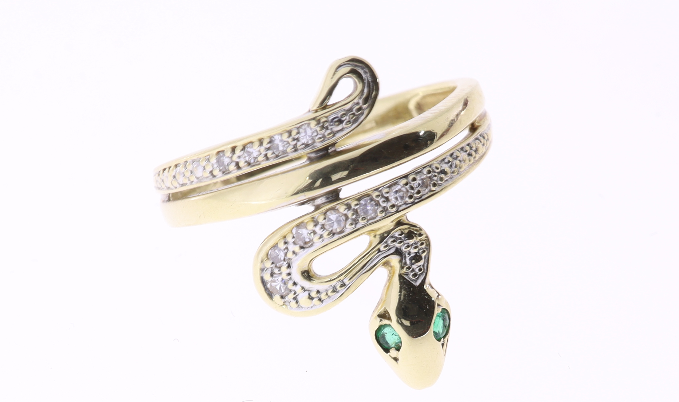 Zlatý prsten ve tvaru hada se smaragdy a diamanty