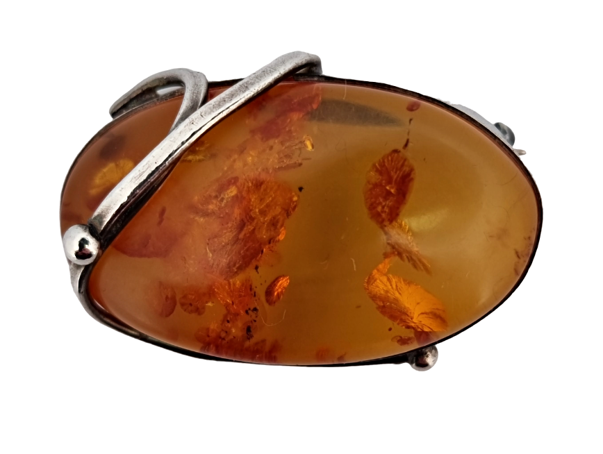 Stříbrná jantarová brož