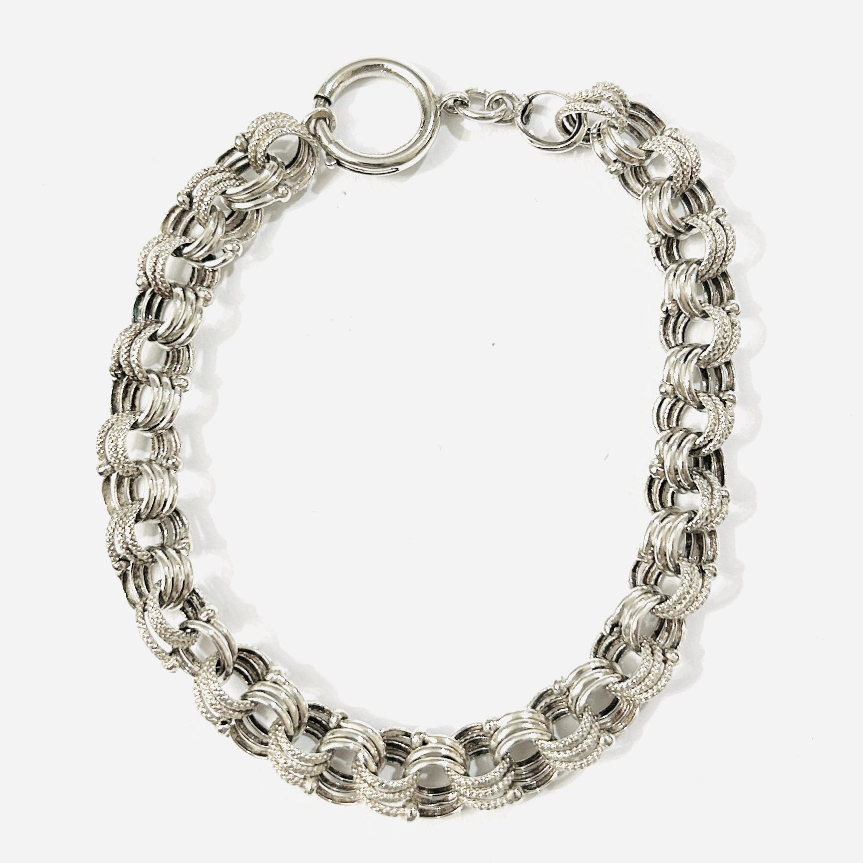 Stříbrný starožitný náramek, pletená vazba