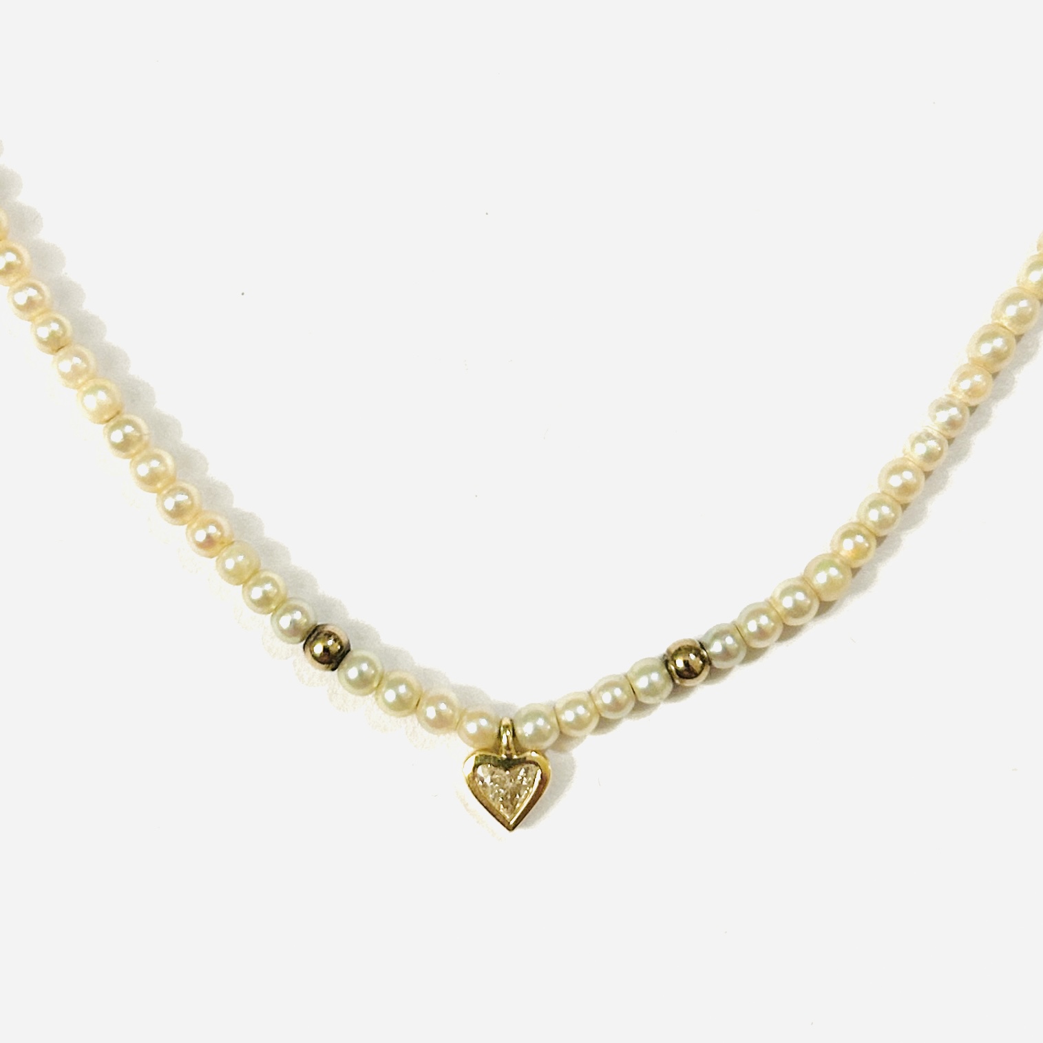 Zlatý perlový náhrdelník s diamantem