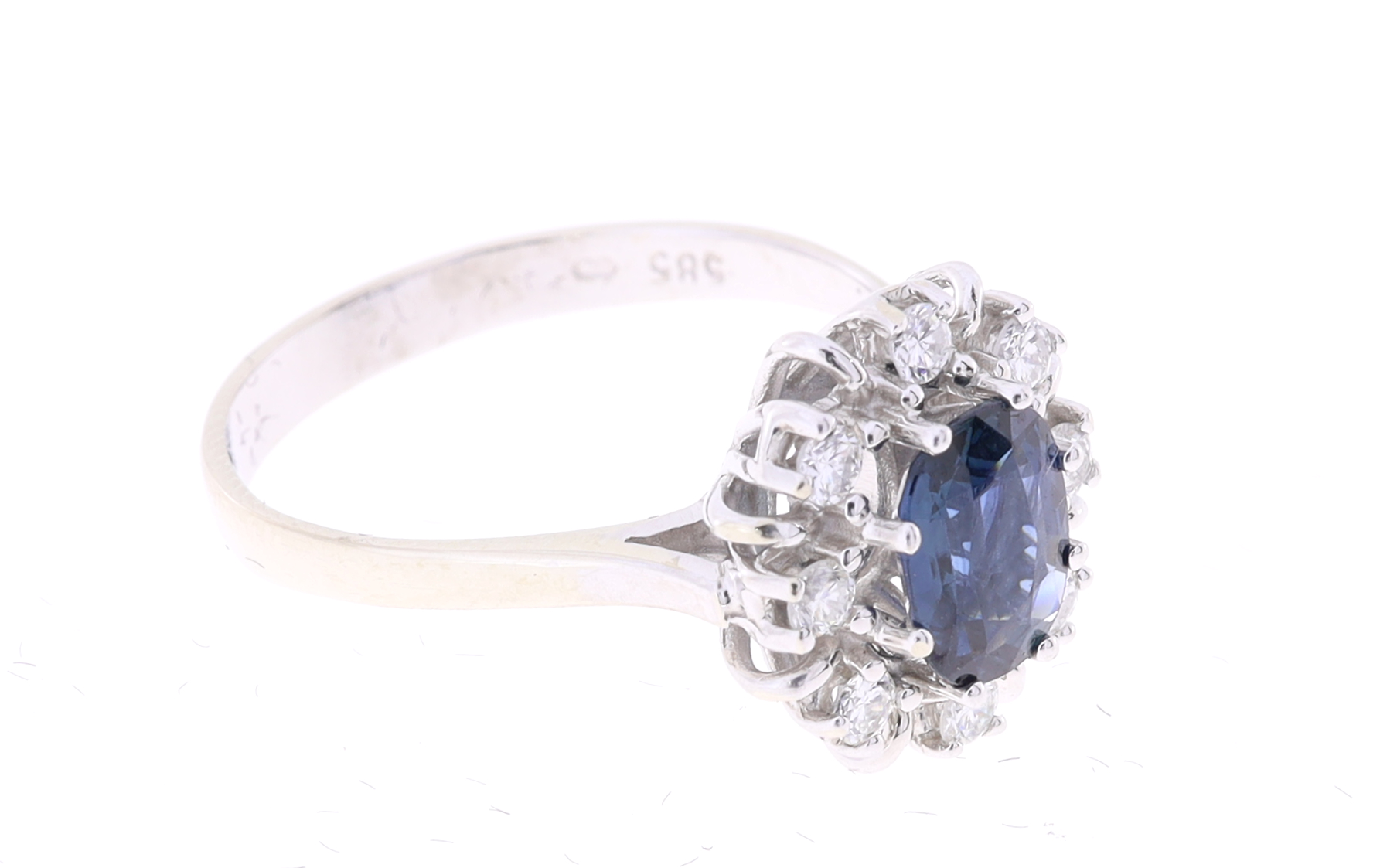 Luxusní prsten z bílého zlata se safírem