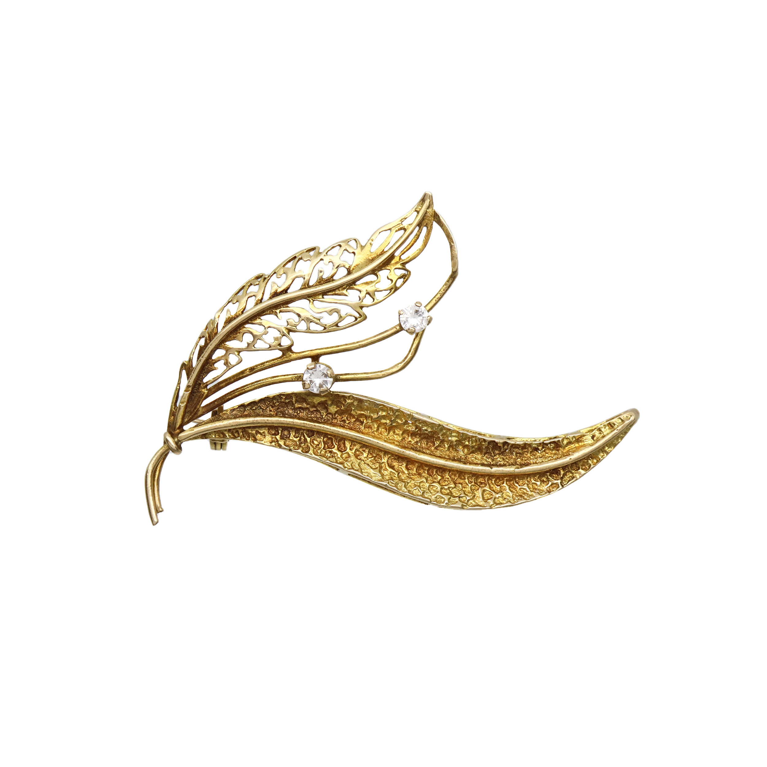 Zlatá brož s bílými kamínky