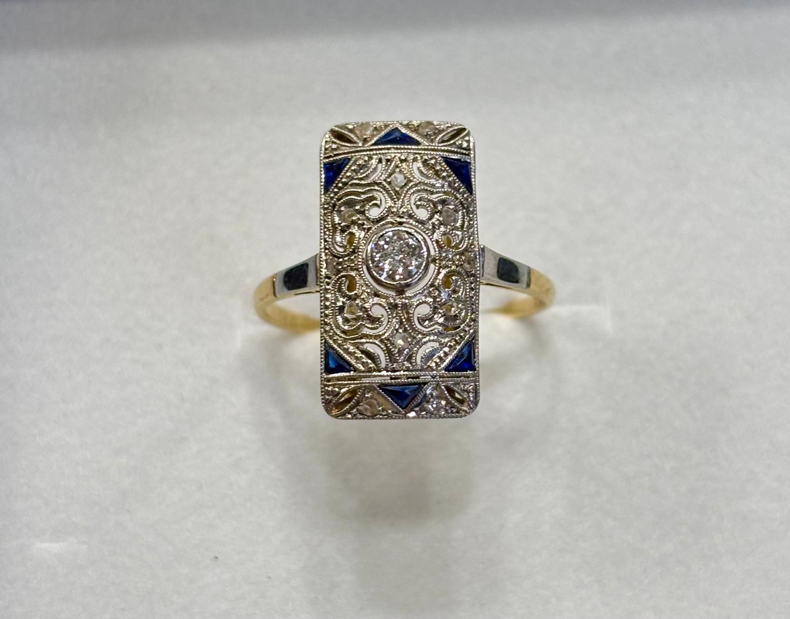 Art Deco prsten s briliantem a safírky