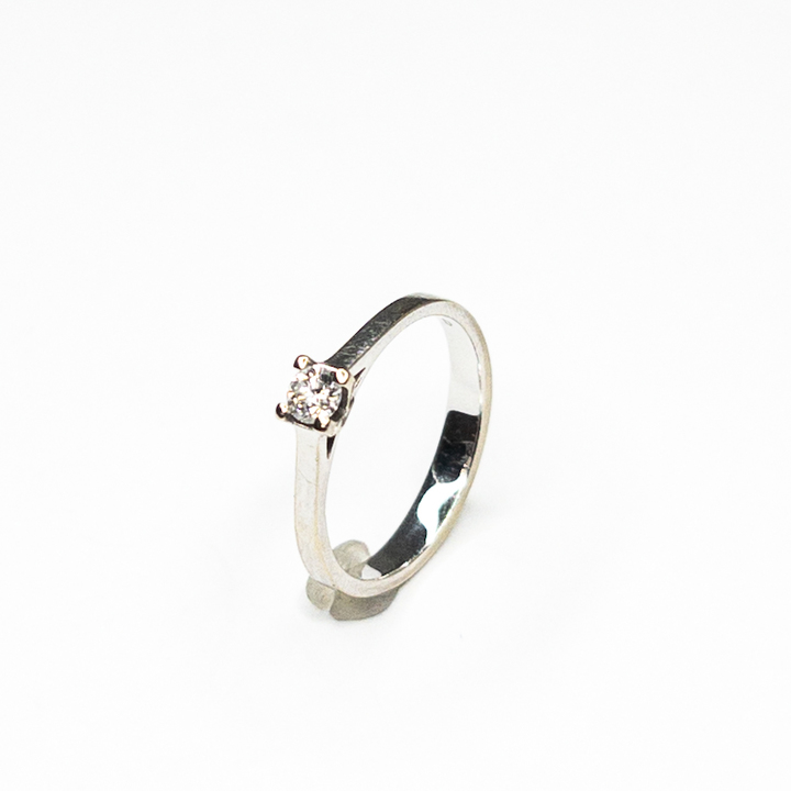 Zlatý prsten se solitérním brilianten 0,16 Ct