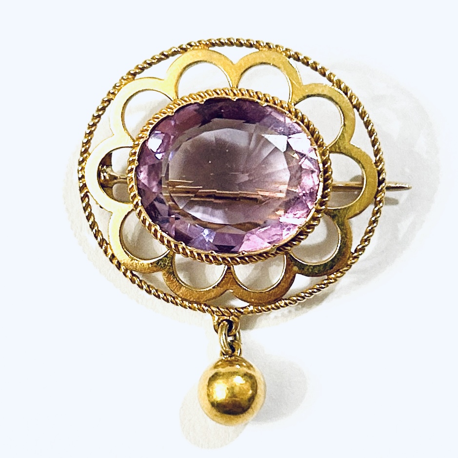 Zlatá starožitná brož s ametystem