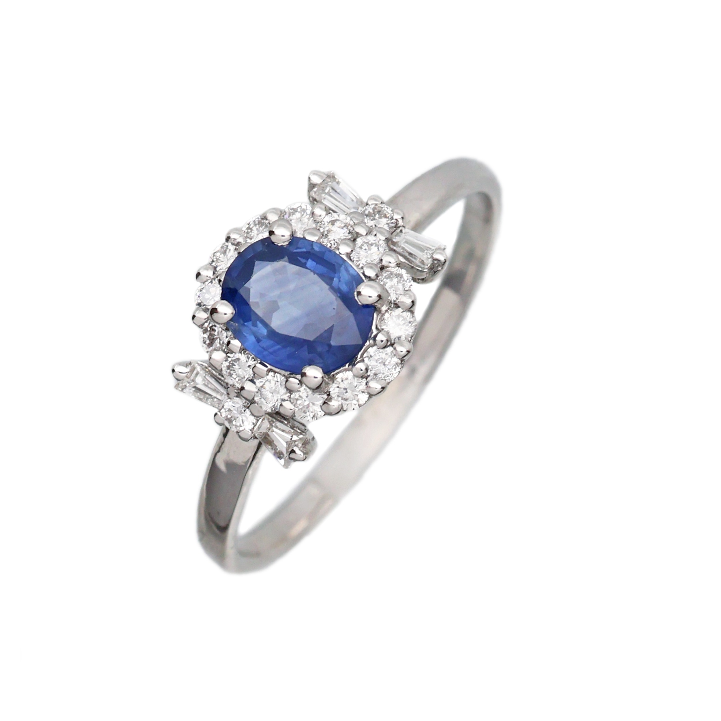 Zlatý prsten s přírodním safírem 0,50 ct a brilianty 0,30 ct