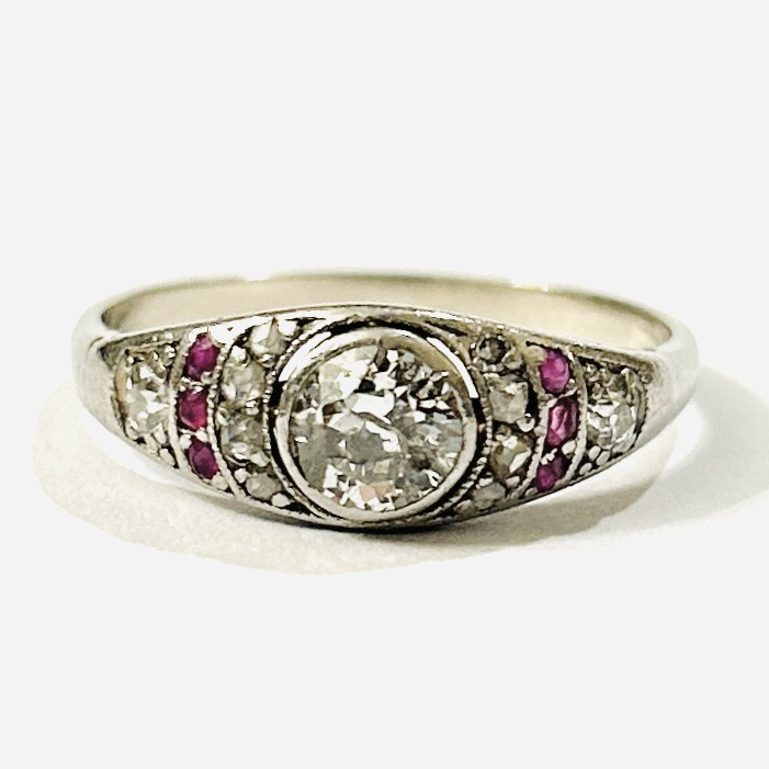 Zlatý art-deco prsten s diamant 0,74 ct a rubíny