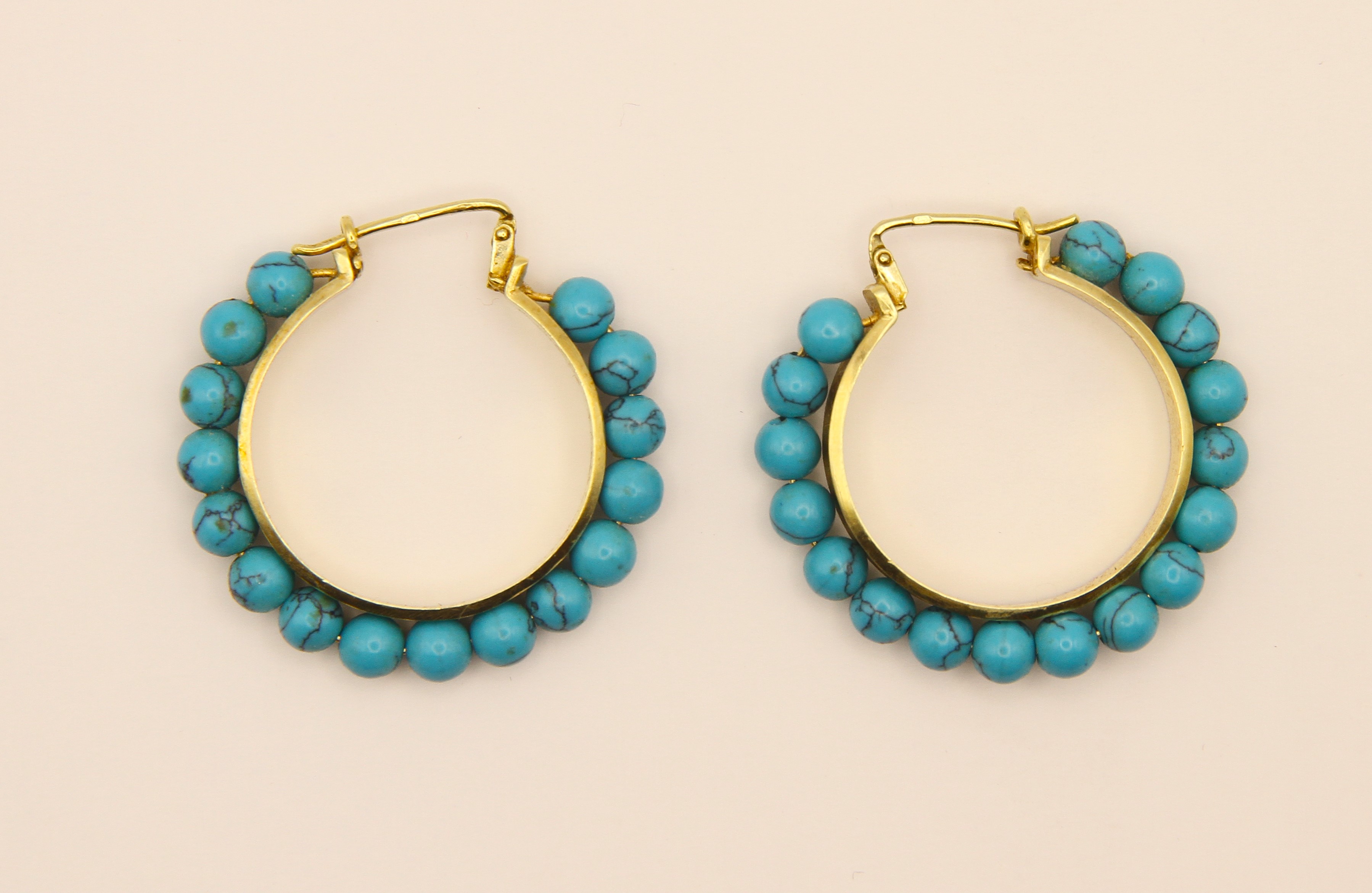 Zlaté náušnice s tyrkysy