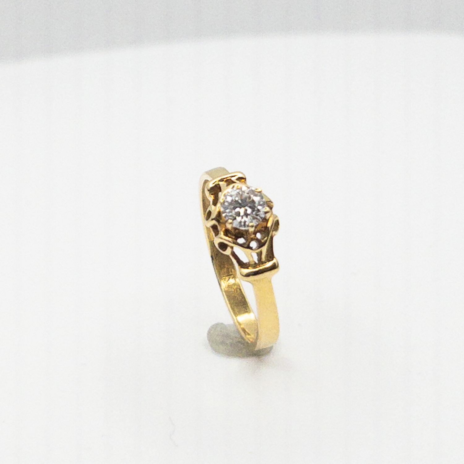 Zlatý prsten se solitérním briliantem 0,25 ct