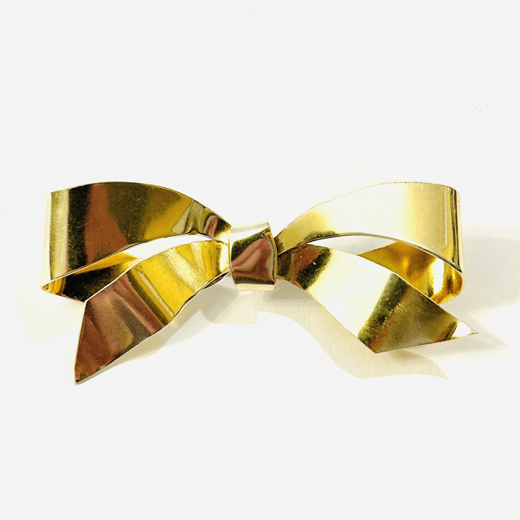 Stříbrná art-deco brož „mašle“