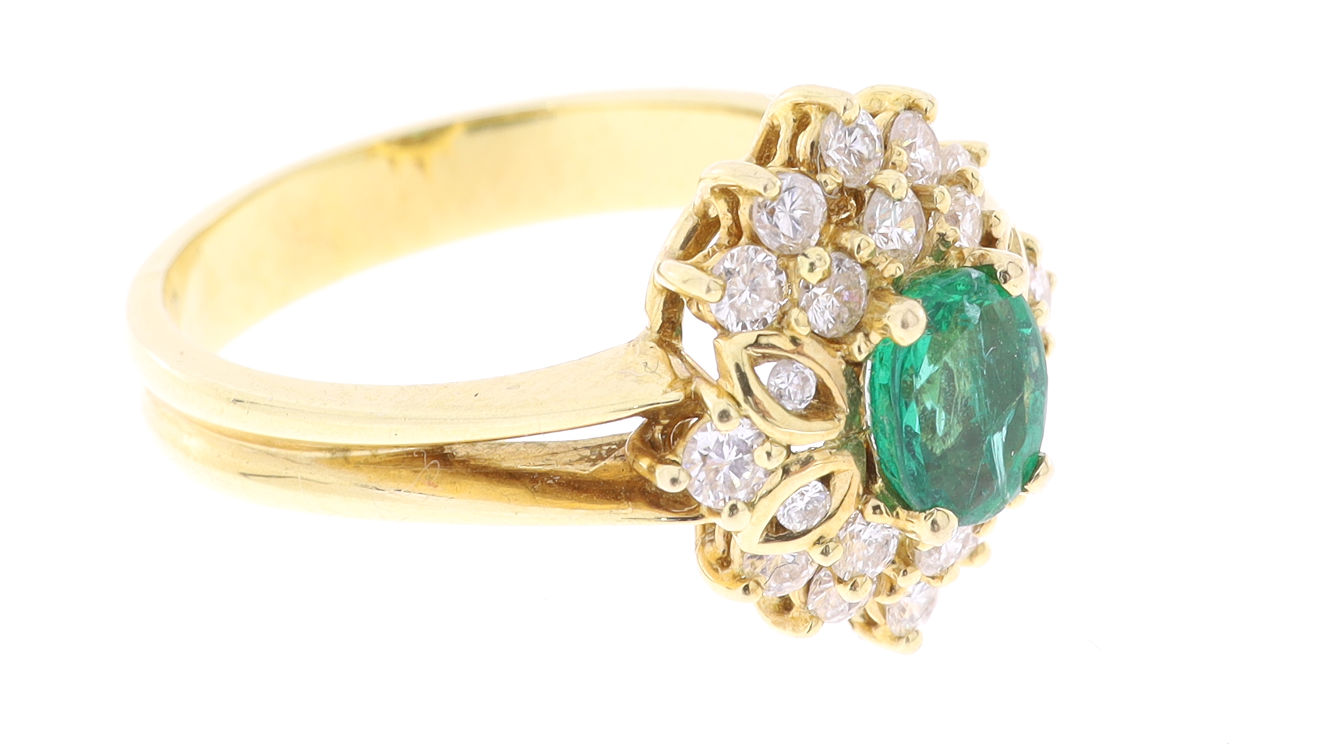 Luxusní zlatý prsten se smaragdem a diamanty