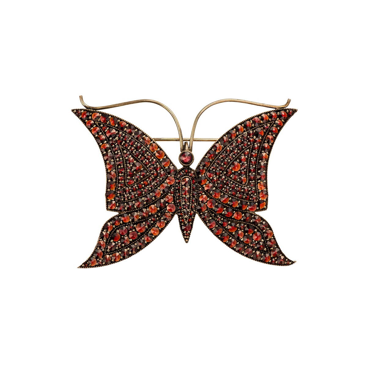 Velká stříbrná brož ve tvaru motýla zdobená českými granáty