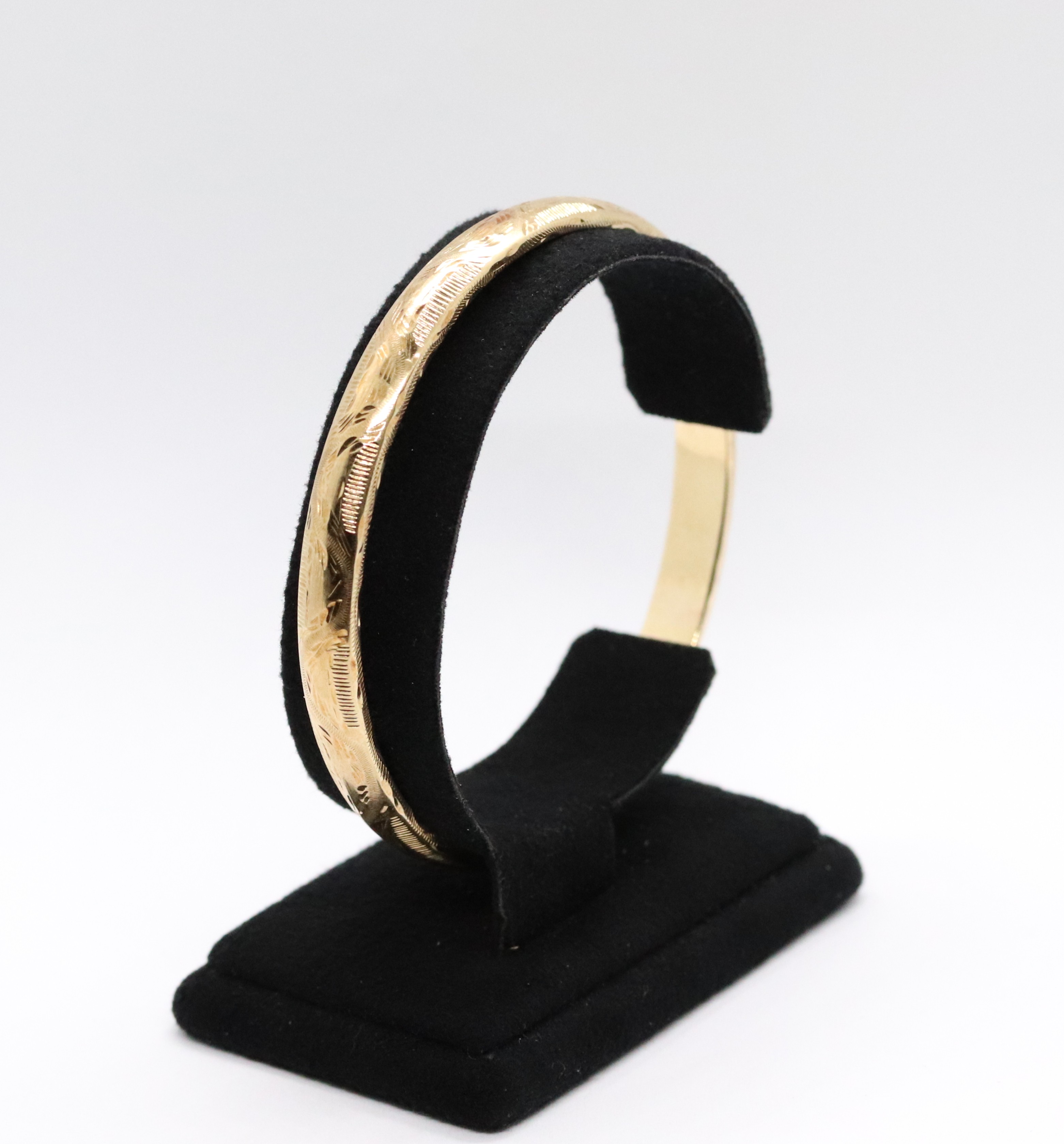 Zlatý art deco náramek