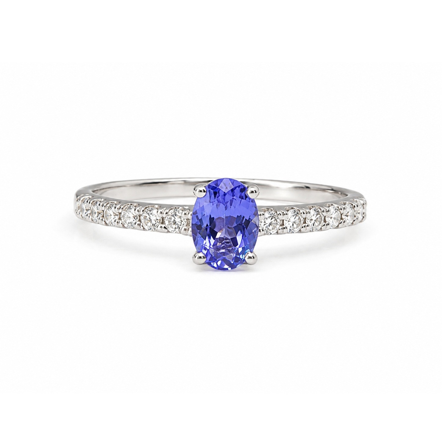 Jemný romantický prsten s diamanty 0,15 ct a tanzanitem 0,30 ct