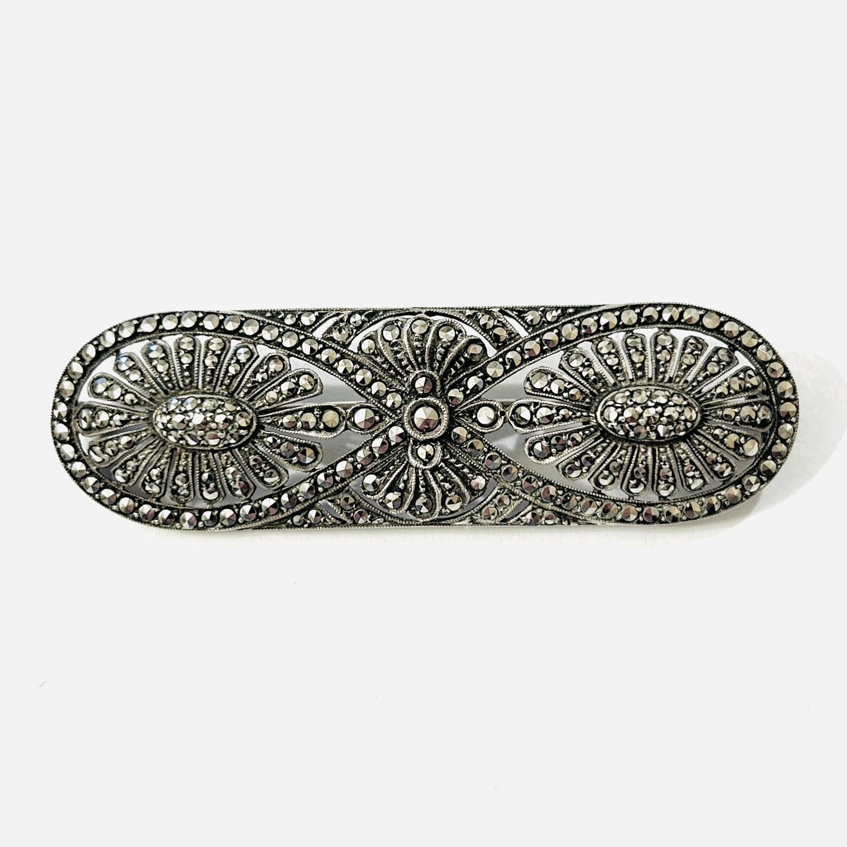 Stříbrná art-deco brož s markazity